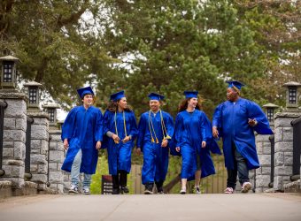 4/12/2016-- Seattle, WA, USAGraduates on Japanese bridge at Tacoma Community College.Photograph by Stuart Isett for Tacoma Community College